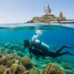 Murudeshwara Temple towering above the turquoise Arabian Sea at golden hour with pristine beach and palm trees